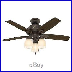 44 Hunter LED Ceiling Fan in Onyx Bengal Bronze with an Amber Glass Light Kit